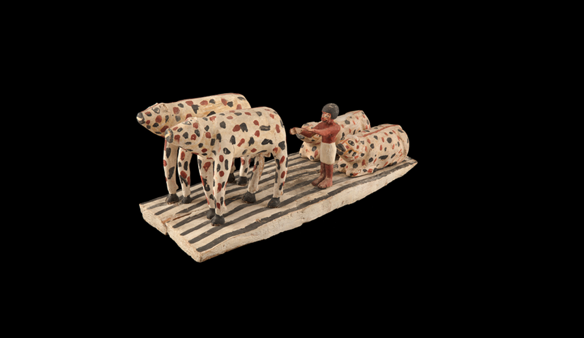 Model of A Man Ploughing Fields